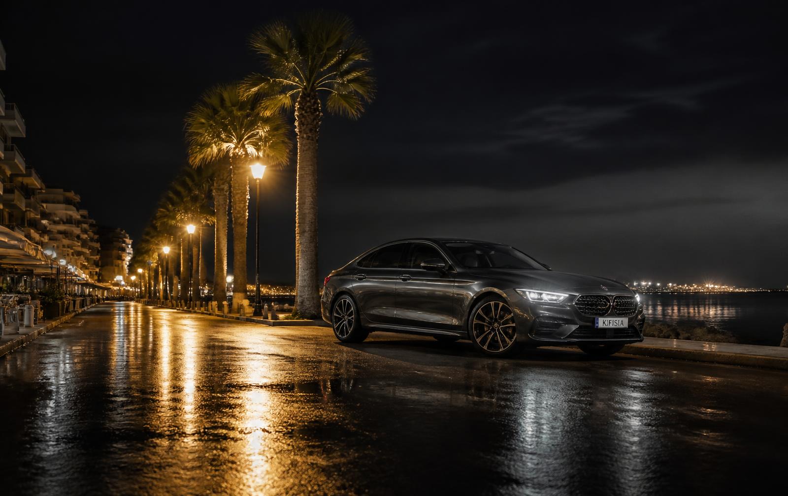 Luxury rental car on the Larnaca seafront at night